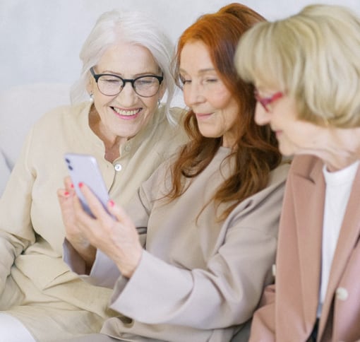 a group of women video chatting on cell phone